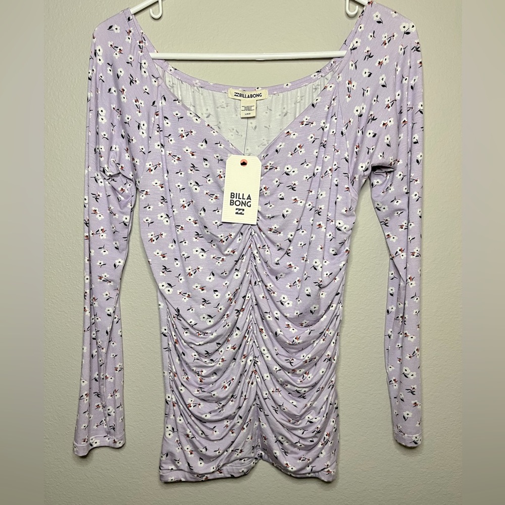 Never worn with tags Large long sleeve shirt.